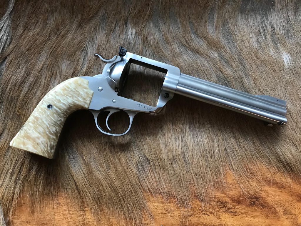 (4) Ruger Blackhawk Bisley with a special cut of musk ox. Very hard to obtain this material.
